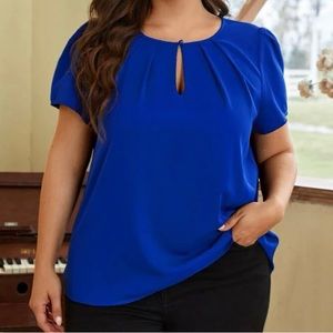 New women’s top never worn.